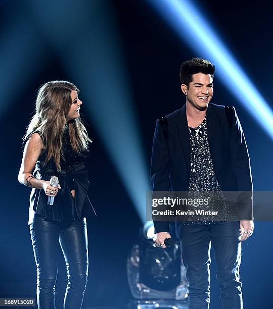Contestant Angie Miller and singer Adam Lambert perform onstage during Fox's "American Idol 2013" Finale Results Show at Nokia Theatre L.A. Live on...