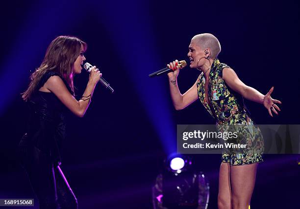 American Idol finalist Angie Miller and singer Jessie J perform onstage during Fox's "American Idol 2013" Finale Results Show at Nokia Theatre L.A....