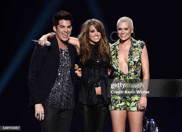 Singer Adam Lambert, Finalist Angie Miller and singer Jessie J perform onstage during Fox's "American Idol 2013" Finale Results Show at Nokia Theatre...