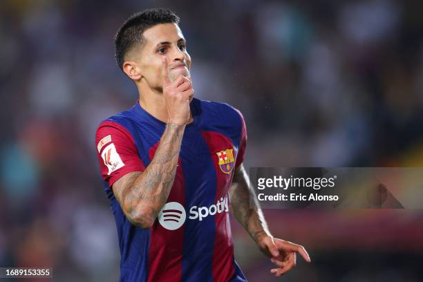 Joao Cancelo of FC Barcelona celebrates after scoring the team's fifth goal during the LaLiga EA Sports match between FC Barcelona and Real Betis at...