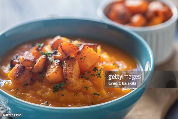 homemade pumpkin cream soup - mashed sweet potato imagens e fotografias de stock