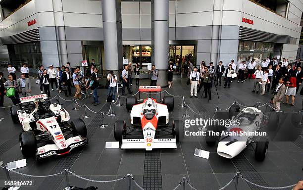 Honda RA106 , 1988 McLaren Honda MP4/4 and 1965 Honda RA272 and are displayed at Honda's headquarters after the press conference on May 16, 2013 in...