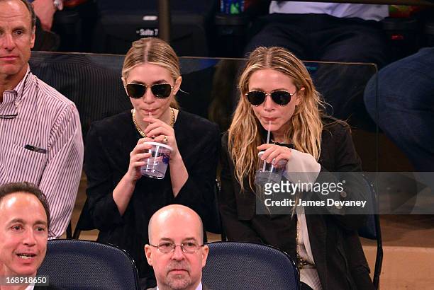 Ashley Olsen and Mary-Kate Olsen attend the Indiana Pacers Vs New York Knicks Game at Madison Square Garden on May 16, 2013 in New York City.