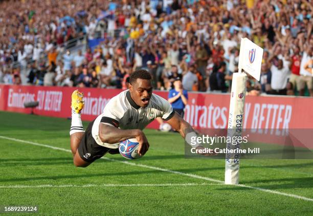 Josua Tuisova of Fiji scores his team's first try during the Rugby World Cup France 2023 match between Australia and Fiji at Stade Geoffroy-Guichard...