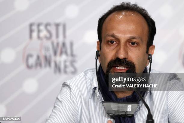 Iranian director Asghar Farhadi talks on May 17, 2013 during a press conference for his film "The Past" presented in Competition at the 66th edition...