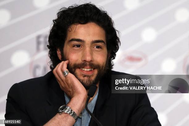 French actor Tahar Rahim smiles on May 17, 2013 while attending a press conference for the film "The Past" presented in Competition at the 66th...