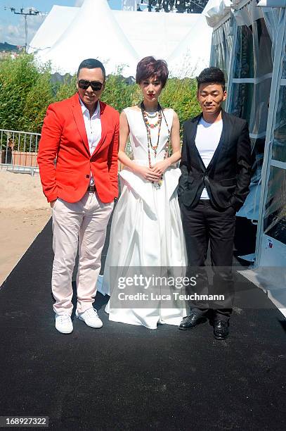 Wang Baoqiang, Eva Huang and Donnie Yen attend the photocall for 'Iceman Cometh 3D' at The 66th Annual Cannes Film Festival at on May 17, 2013 in...