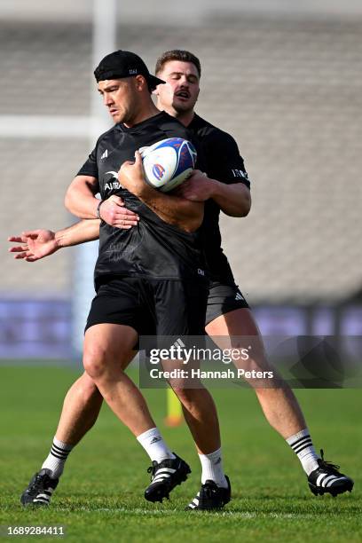 David Havilli and Dalton Papali'i of the All Blacks run through drills during a New Zealand All Blacks training session at Stade...