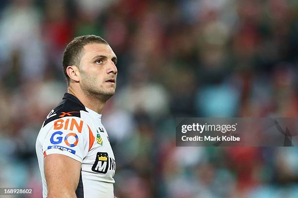 Robbie Farah of the Tigers looks dejected as he looks up at the big screen during the round 10 NRL match between the South Sydney Rabbitohs and the...