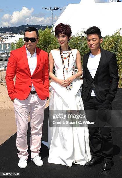 Donnie Yen, Eva Huang and Wang Boaqiang attend the 'Iceman Cometh 3D' Photocall and Press conference at the 66th Annual Cannes Film Festival on May...