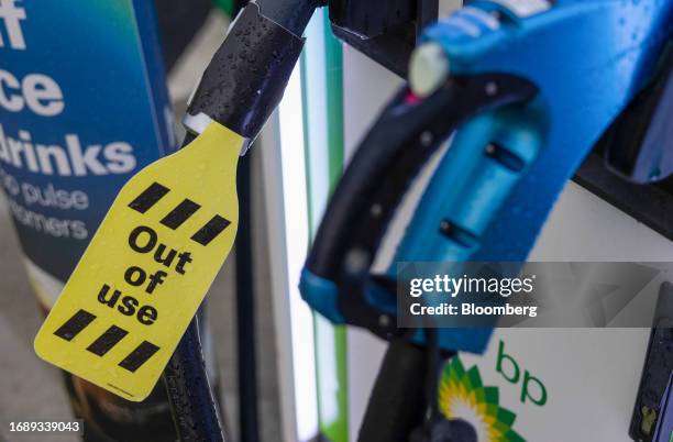 Tag which reads "Out Of Use" on a BP Pulse electric vehicle charging point at a BP Plc petrol station in South Woodham Ferrers, UK, on Friday, Sept....