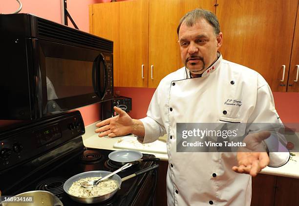 Todd Guerrin B.C. Chef in the test kitchen , cooking Maple Cured Salmon dish, that he makes frequently for the fancy people who ride the rocky...