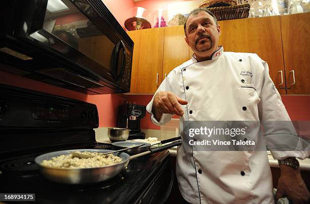 Todd Guerrin B.C. Chef in the test kitchen , cooking Maple Cured Salmon dish, that he makes frequently for the fancy people who ride the rocky...