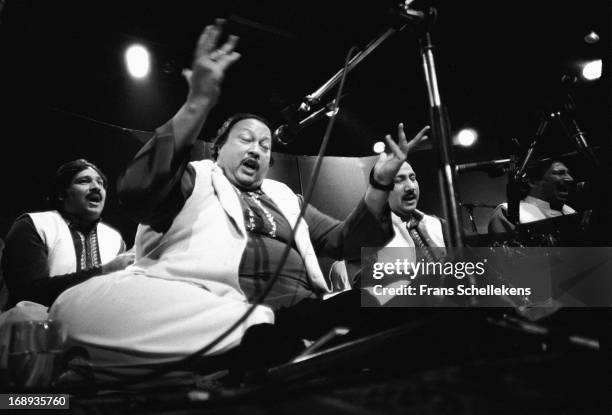 Pakistani musician Nusrat Fateh Ali Khan performs live on stage at the Melkweg in Amsterdam, Netherlands on 28th February 1988.