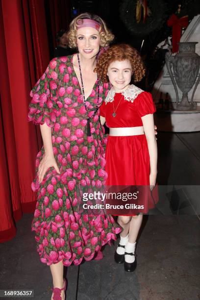 Jane Lynch as "Miss Hannigan" and Lilla Crawford as "Annie" pose backstage at Jane Lynch's opening night in Broadway's "Annie" at The Palace Theater...