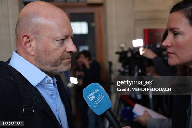 Jean-Christophe Couvry, head of the police union Unit SGP police, speaks to the press before the trial of the Magnanville attacks at the Paris...