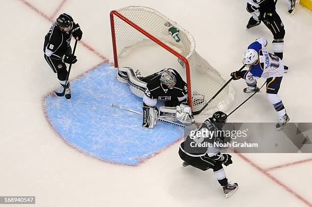 Jonathan Quick of the Los Angeles Kings makes the save against Andy McDonald of the St. Louis Blues in Game Six of the Western Conference...