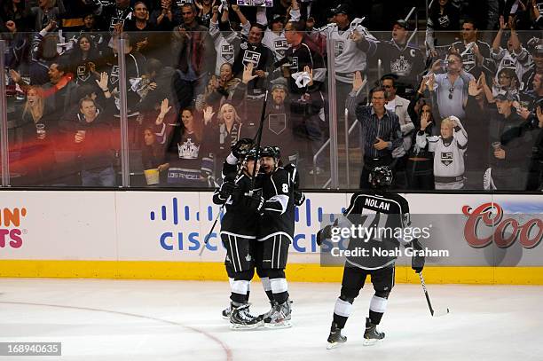 The Los Angeles Kings celebrate after a goal against the St. Louis Blues in Game Six of the Western Conference Quarterfinals during the 2013 NHL...