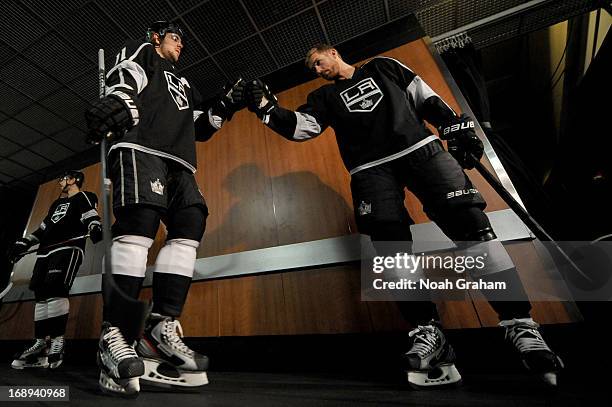 Anze Kopitar and Jeff Carter of the Los Angeles Kings prepare to take the ice to warm up prior to the game against the St. Louis Blues in Game Six of...