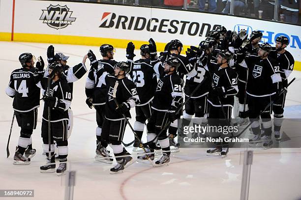 The Los Angeles Kings celebrate after defeating the St. Louis Blues in Game Six of the Western Conference Quarterfinals during the 2013 NHL Stanley...