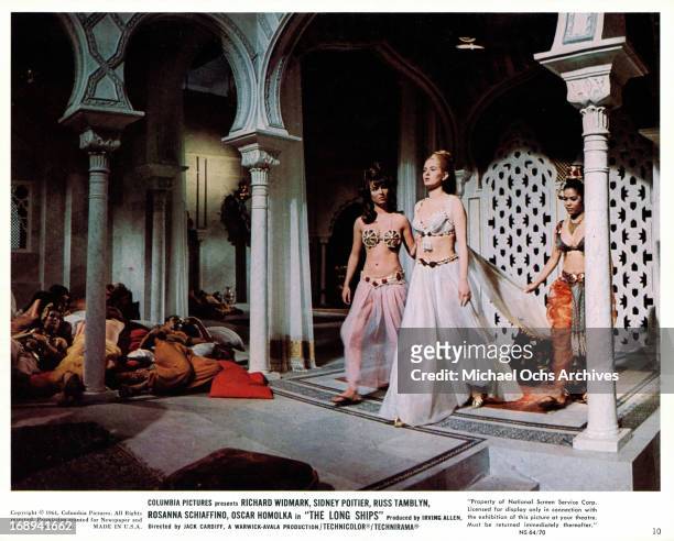 Beba Loncar walks through a palace in a scene from the film 'The Long Ships', 1964.