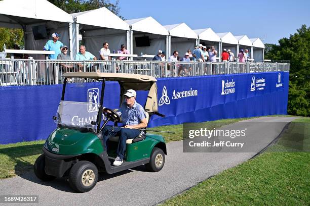 Steve Flesch drives his golf cart to the 13th green during the third round of the Ascension Charity Classic at Norwood Hills Country Club on...