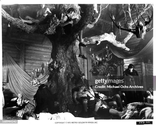 Helmut Berger attends a party in a scene from the film 'Ludwig', 1972.