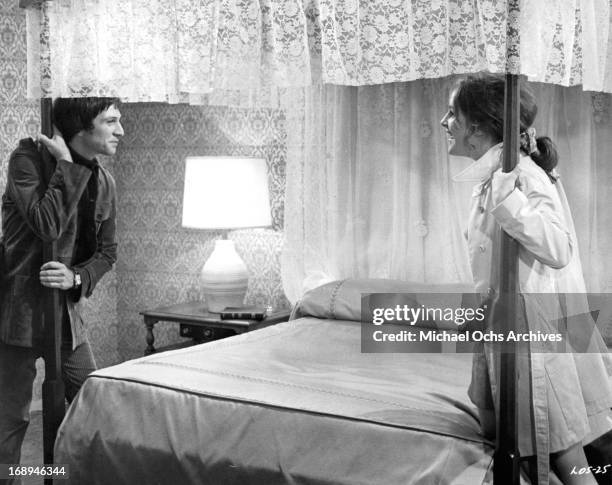 Michael Brandon and Bonnie Bedelia are confronted with their wedding suite in a scene from the film 'Lovers And Other Strangers', 1970.