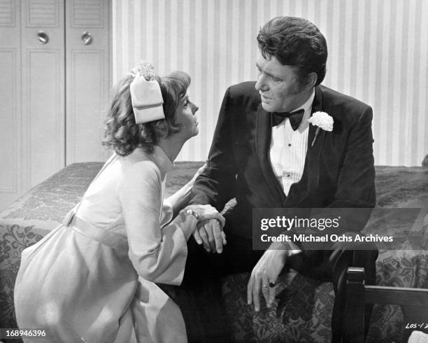 Anne Meara pleads with Harry Guardino in a scene from the film 'Lovers And Other Strangers', 1970.