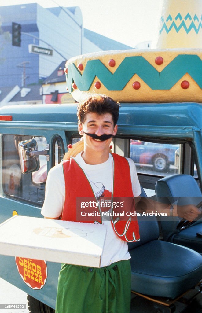 Patrick Dempsey delivers pizza in a scene from the film 'Loverboy