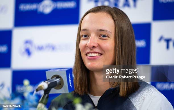 Iga Swiatek of Poland talks to the media on Day 1 of the Toray Pan Pacific Open at Ariake Coliseum on September 25, 2023 in Tokyo, Japan