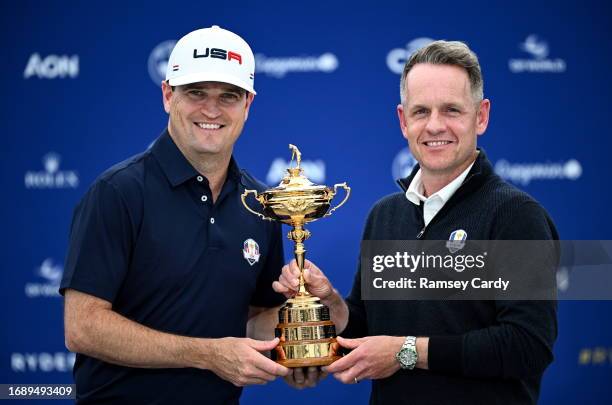 Rome , Italy - 25 September 2023; USA captain Zach Johnson, left, and Europe captain Luke Donald pose with the Ryder Cup during a press conference...