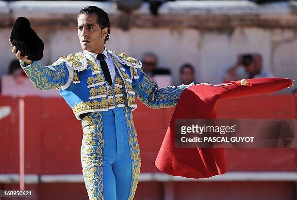 Spanish matador Ivan Fandino receives an ovation on May 17, 2013 during the Nimes Pentecost Feria in Nimes, southwestern France. AFP PHOTO / PASCAL...