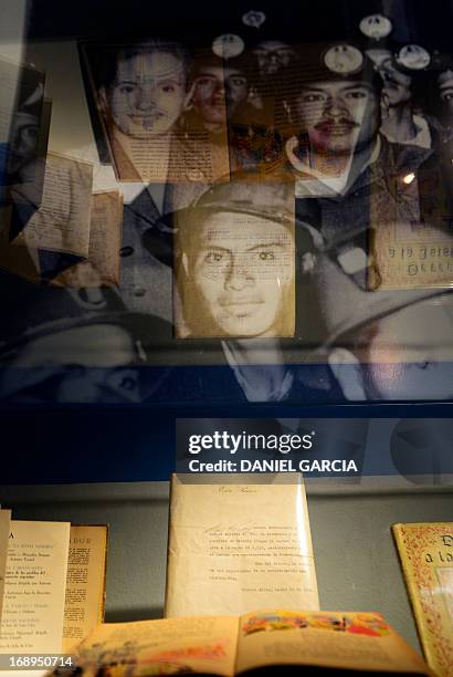 Books, letters and a picture of Eva Duarte de Peron, "Evita" with miners, displayed at the main hall of the Evita Museum in Buenos Aires on May 16,...