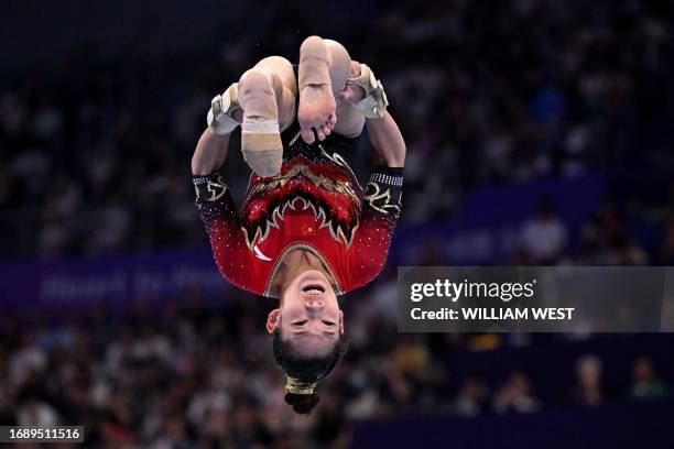 China's Tang Xijing competes in the floor exercise in the artistic gymnastics women's team final at the Hangzhou 2022 Asian Games in Hangzhou,...