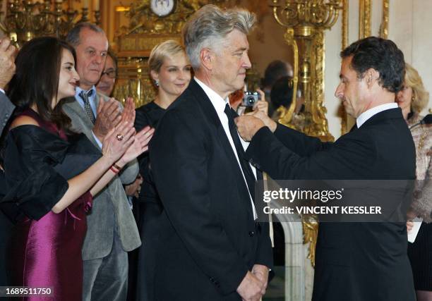 French President Nicolas Sarkozy awards US filmmaker, David Lynch with the Legion of Honour, France's top civilian honour, 01 October 2007 at the...