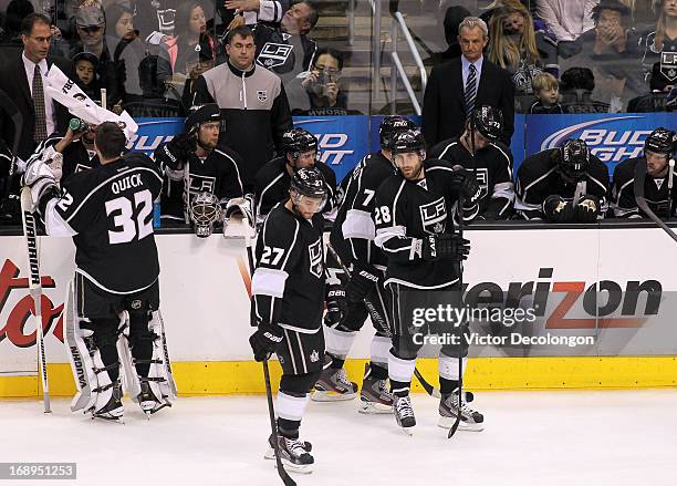 Jarret Stoll of the Los Angeles Kings looks on infront of the Kings bench during a break in action of Game Six of the Western Conference...