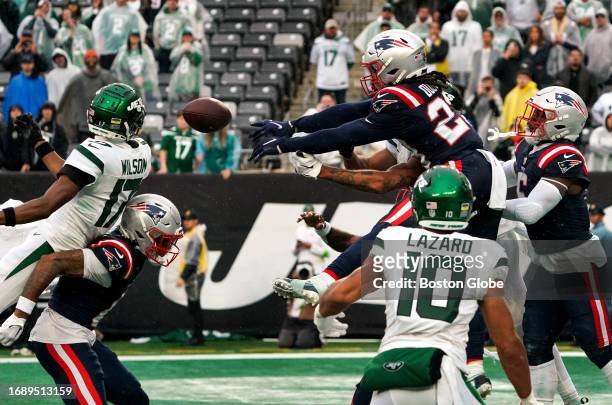 East Rutherford, NJ New England Patriots S Kyle Dugger bats the ball out of the end zone on the final play of the game. The Patriots beat the New...
