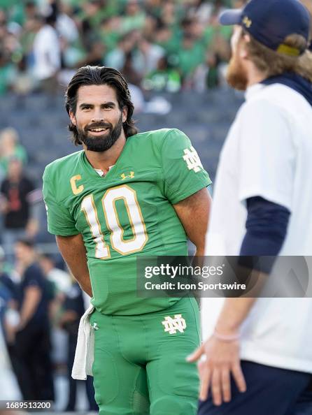 Notre Dame Fighting Irish Quarterback Sam Hartman Communicates With notre-dame-fighting-irish-quarterback-sam-hartman-communicates-with