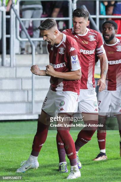 Albion Rrahmani of Rapid Bucuresti celebrates after scoring a goal during the SuperLiga Round 10 match between Rapid Bucuresti and CFR Cluj at...