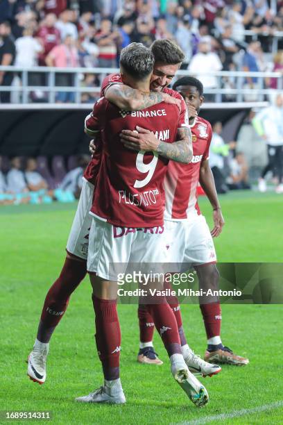 Albion Rrahmani of Rapid Bucuresti celebrates the goal scored with his teammate Alexandru Albu during the SuperLiga Round 10 match between Rapid...
