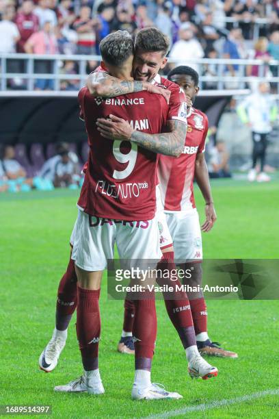 Albion Rrahmani of Rapid Bucuresti celebrates the goal scored with his teammate Alexandru Albu during the SuperLiga Round 10 match between Rapid...