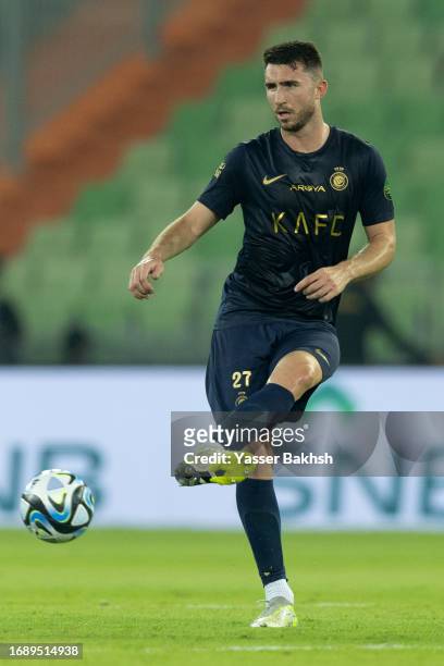 Aymeric Laporte of Al Nassr passes the ball during Saudi King's Cup match between Al Nassr and Ohod at Prince Abdullah Al Faisal Stadium on September...