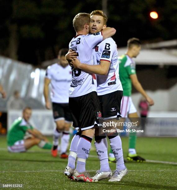 Louth , Ireland - 25 September 2023; Daryl Horgan of Dundalk celebrates with teammate Paul Doyle, right, after scoring their side's third goal during...
