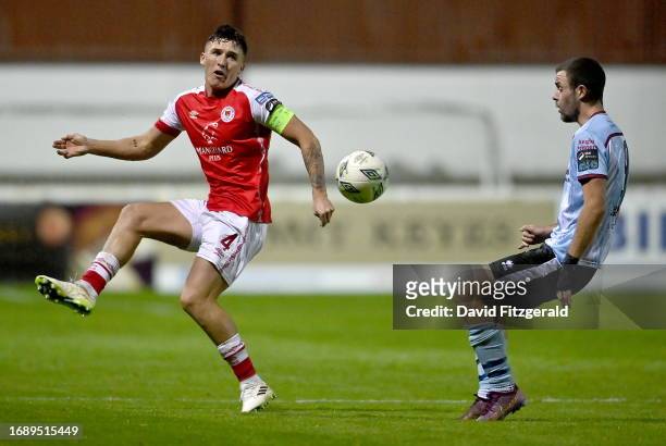 Dublin , Ireland - 25 September 2023; Joe Redmond of St Patrick's Athletic in action against Kyle Robinson of Drogheda United during the SSE...