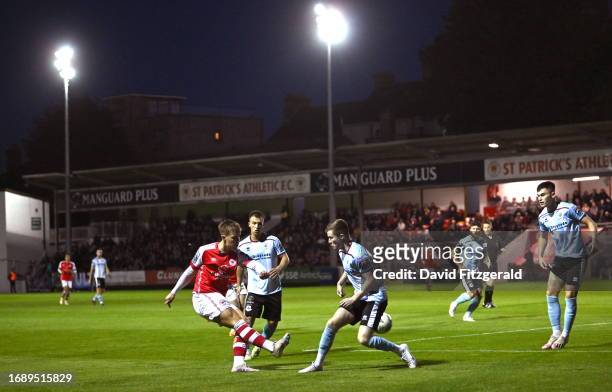Dublin , Ireland - 25 September 2023; Tommy Lonergan of St Patrick's Athletic in action against Matthew O'Brien of Drogheda United during the SSE...