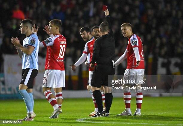 Dublin , Ireland - 25 September 2023; Jake Mulraney of St Patrick's Athletic is shown a red card by referee David Dunne during the SSE Airtricity...