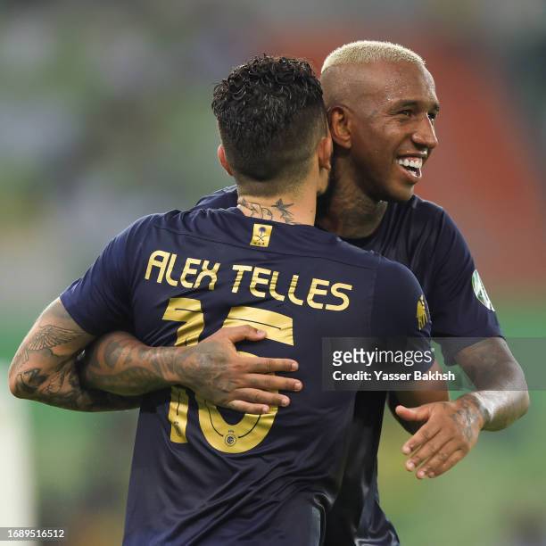 Anderson Talisca and Alex Telles of Al Nassr celebrates a third goal during King's Cup of Champions match between Ohod and Al Nassr at Prince...
