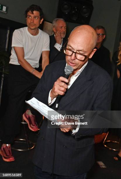 Dylan Jones speaks during a panel talk as Jackson Boxer, Jeremy King and Jeremy Lee look on at the launch of 'The Art Of Dining: Celebrate London...