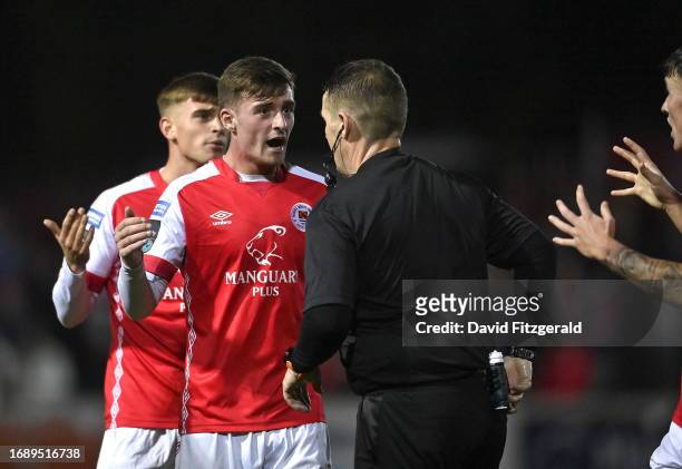 Dublin , Ireland - 25 September 2023; St Patrick's Athletic players remonstrate with referee David Dunne after he showed a red card to Sam Curtis...